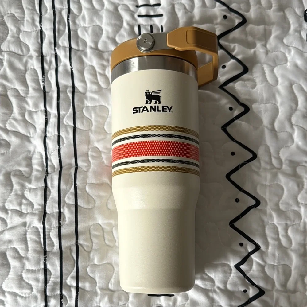 Stanley Cream Travel Tumbler with Mustard Handle and Red Accent Stripes